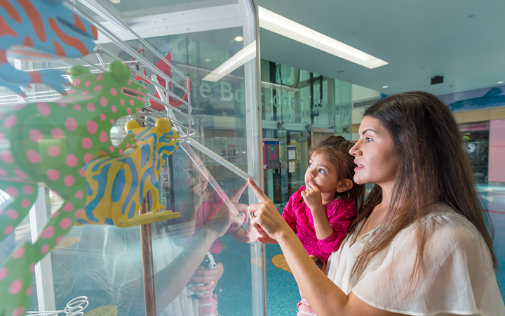 Mom and daughter in Children’s Hospital Colorado atrium