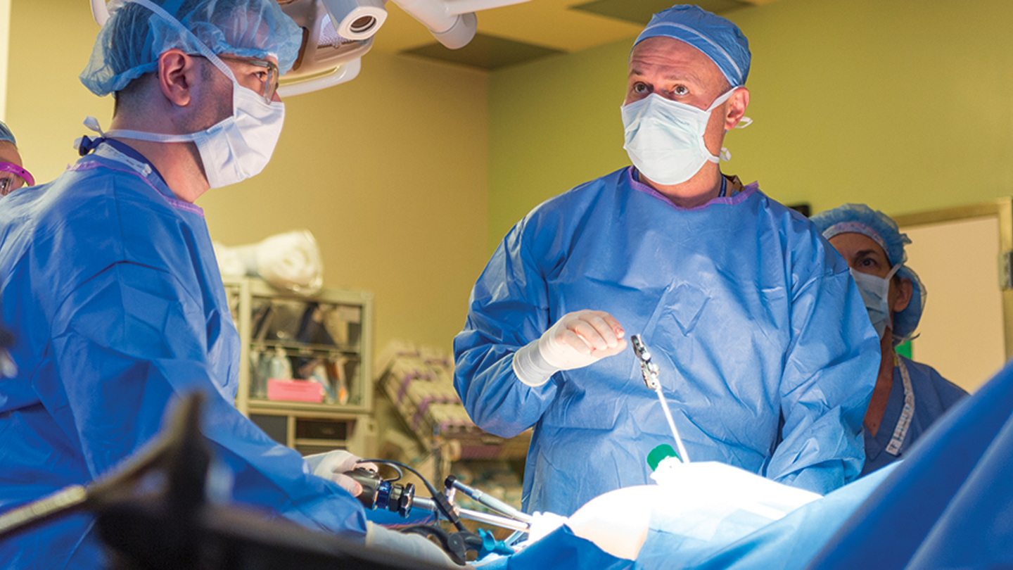 Photo of Dr. Thomas Inge performing bariatric surgery in the operating room