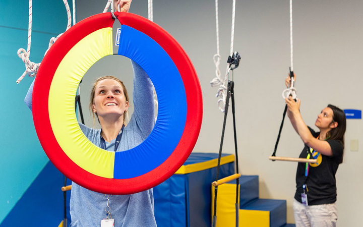 Therapists setting up equipment in Highlands Ranch