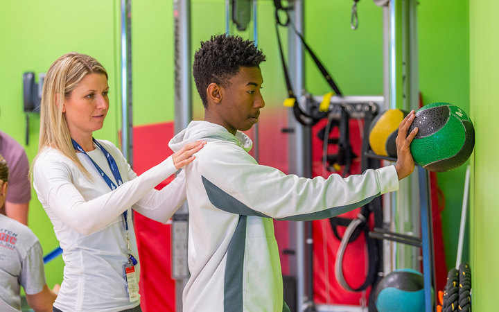 Therapist and patient at Sports Therapy Gym in Parker