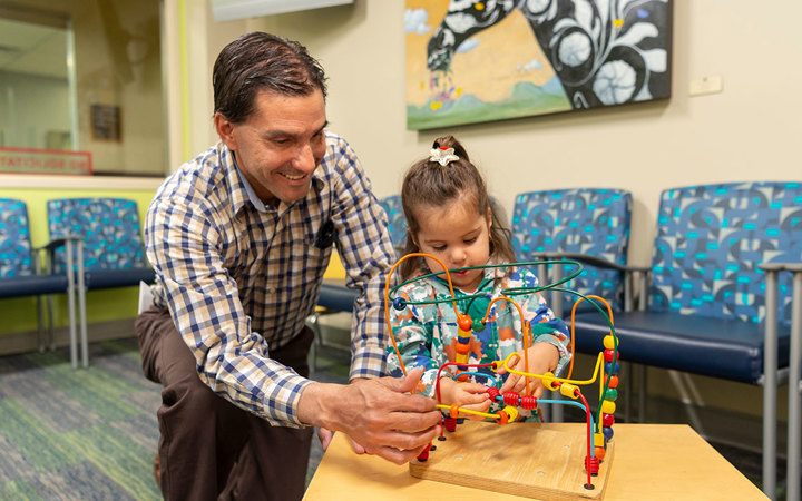 Children's Colorado Outpatient and Urgent Care, Wheat Ridge parent with child in waiting room